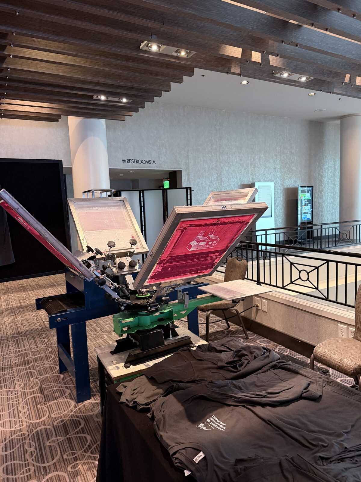 Multi-station press setup running at full pace during an event